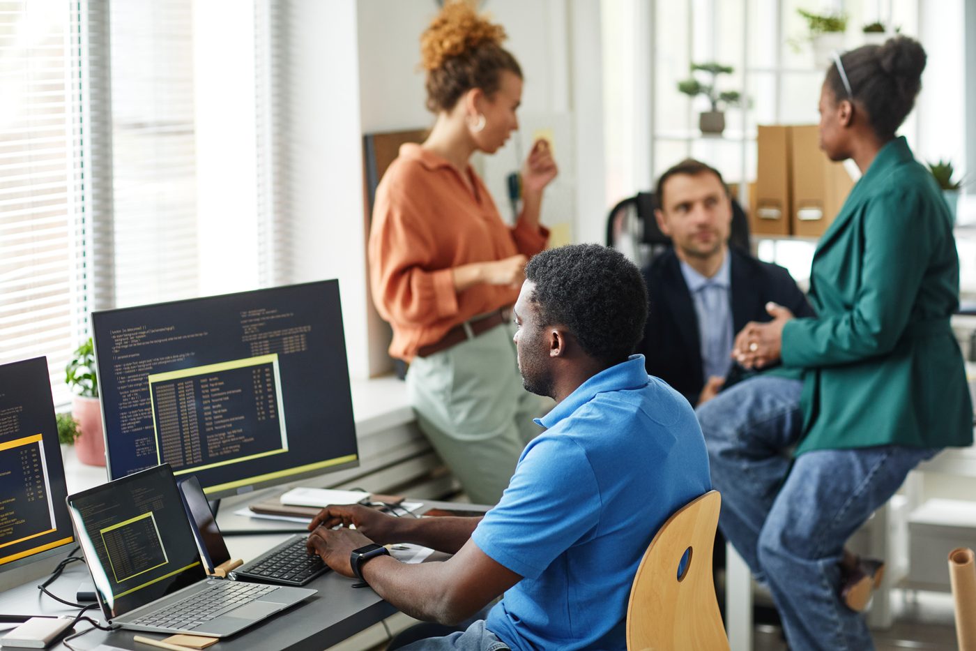 The Dtech team building software in a New Orleans office